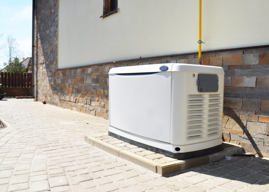 Generator on stone patio outside Illinois home